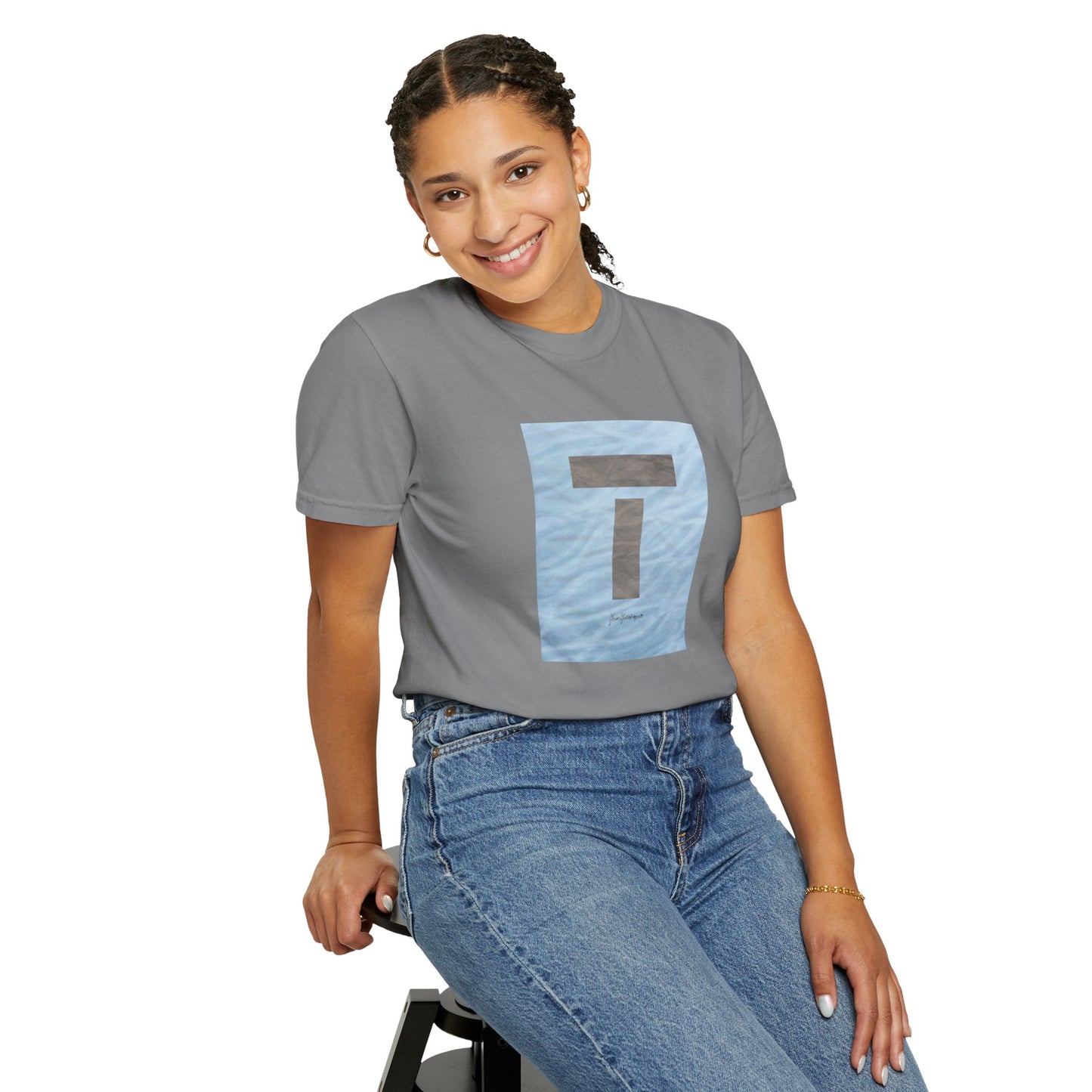 T symbol, Star Energy in a soft grey with light blue water reflections, Unisex Garment-Dyed T-shirt by artist Marie Frederique
