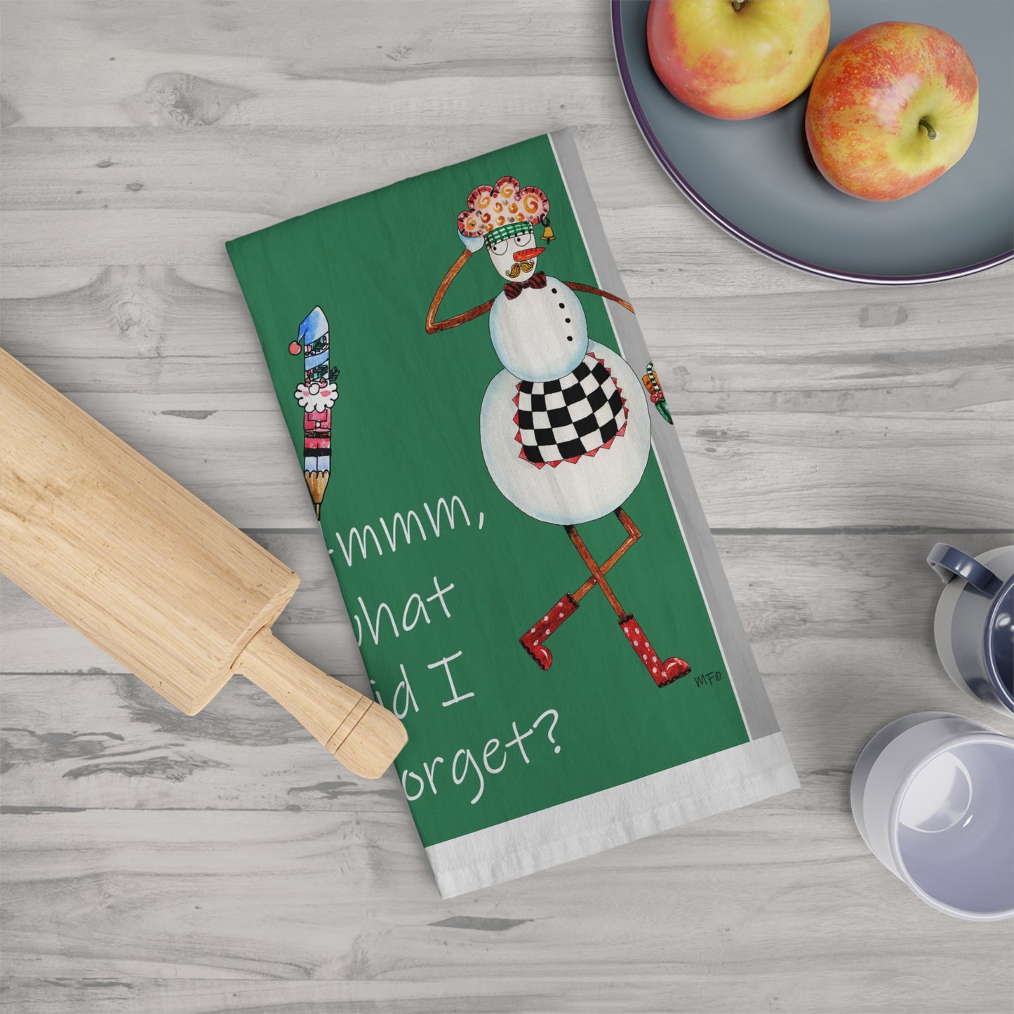 Christmas Tea Towel - Hmmm, what did I forget? by artist Marie Frederique