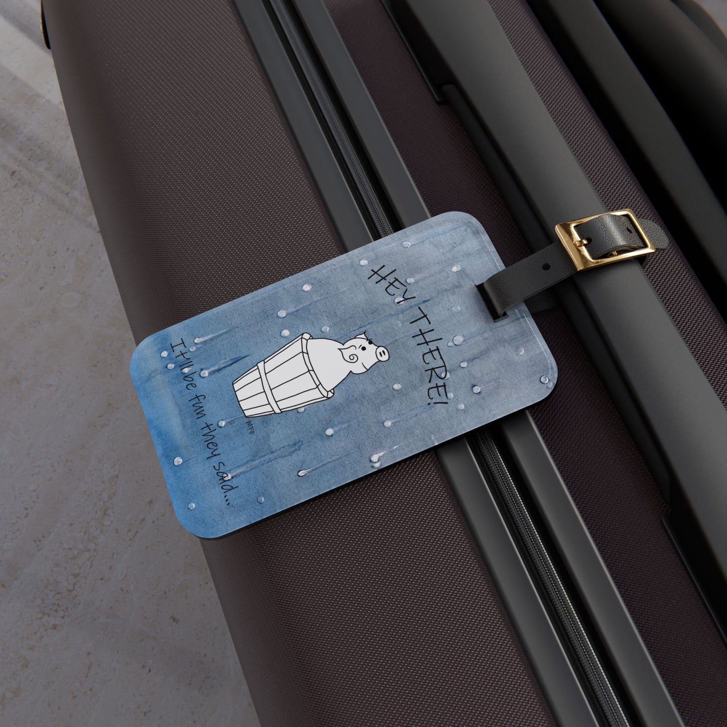 Luggage Tag with leather strap, Mr. Pig - It'll be fun they said... on a blue wet look background by artist Marie Frederique