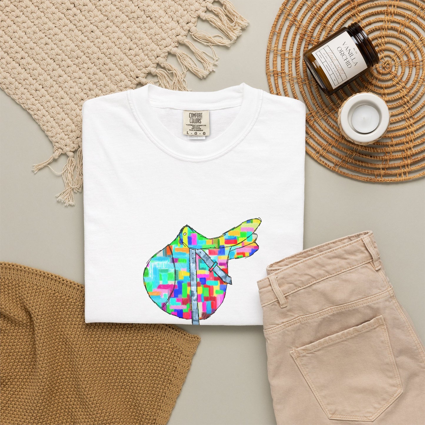 Saddle Patchwork T-Shirt — Colorful Equestrian Graphic Tee by artist Marie Frederique