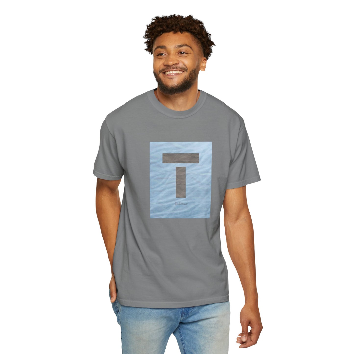 T symbol, Star Energy in a soft grey with light blue water reflections, Unisex Garment-Dyed T-shirt by artist Marie Frederique