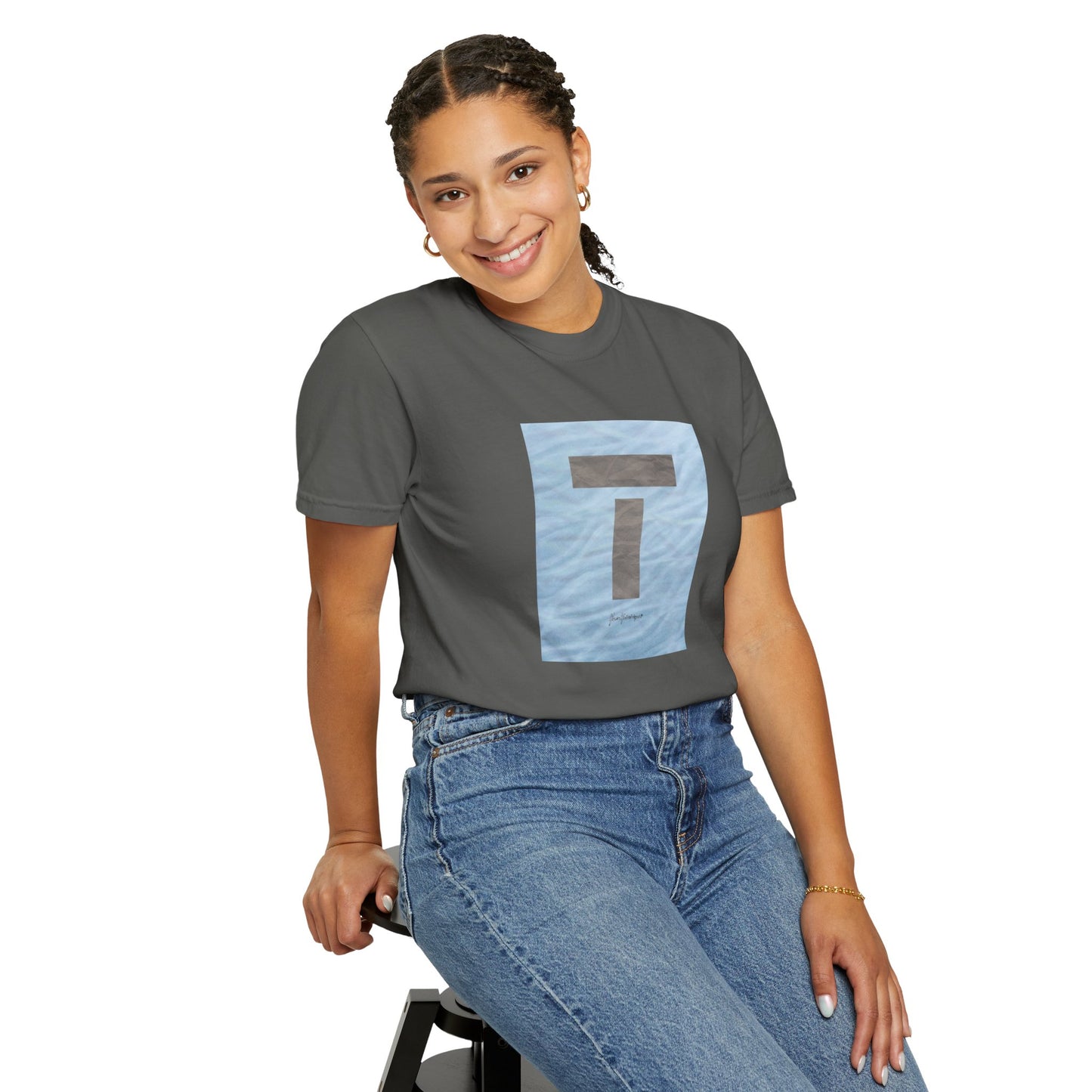 T symbol, Star Energy in a soft grey with light blue water reflections, Unisex Garment-Dyed T-shirt by artist Marie Frederique