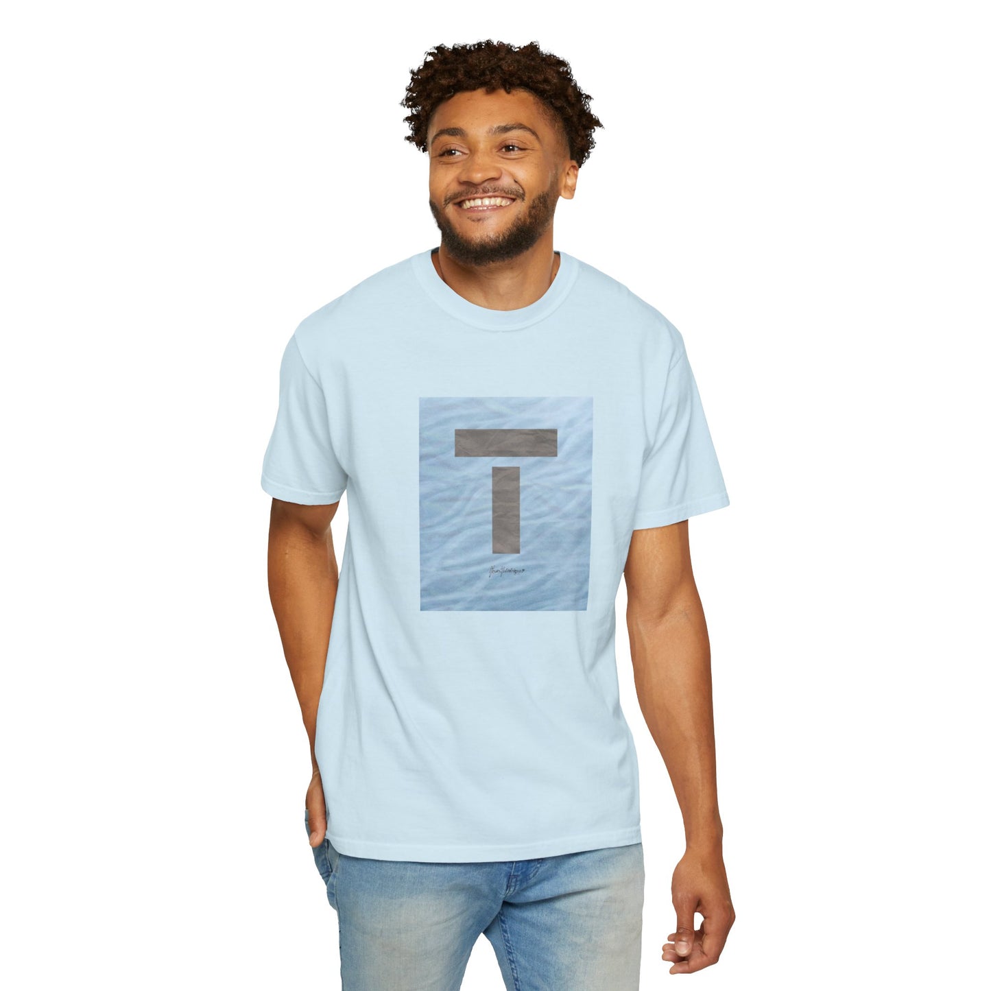 T symbol, Star Energy in a soft grey with light blue water reflections, Unisex Garment-Dyed T-shirt by artist Marie Frederique