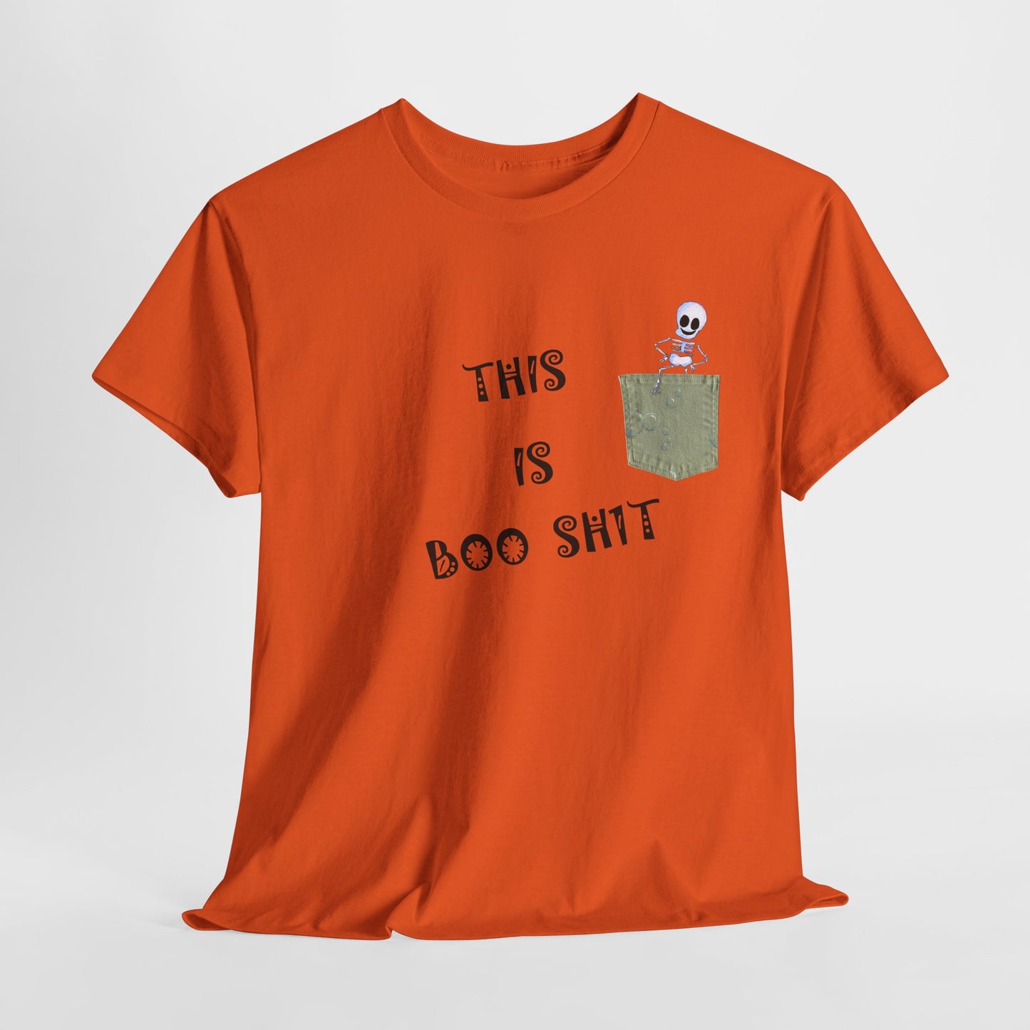 Halloween "THIS IS BOO SH1T" - with a skeleton climbing out of a false pocket, Unisex Heavy Cotton Tee by artist Marie Frederique