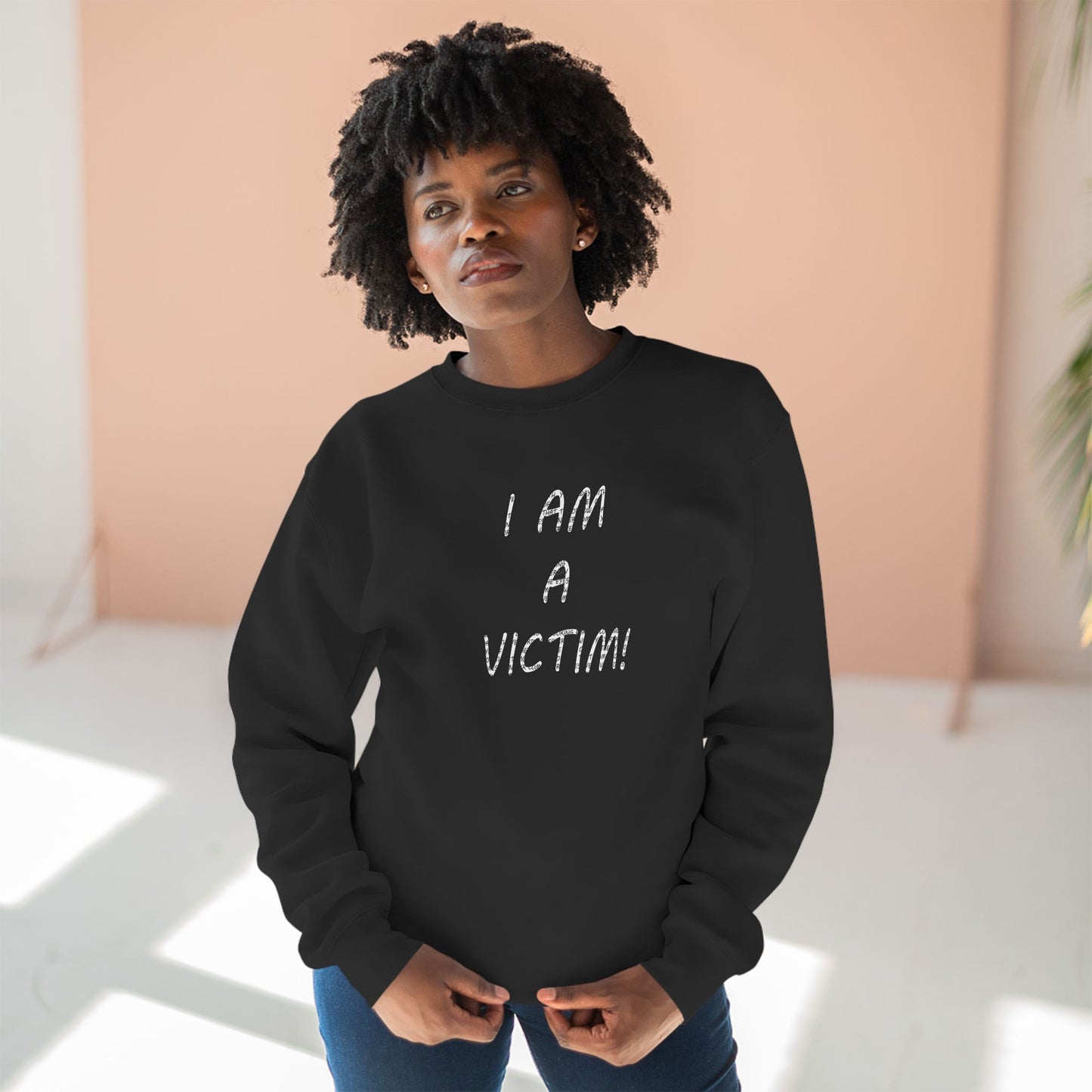 I AM a Victim - Eyes of yesterday! Unisex Crewneck Sweatshirt in black By Artist Marie Frederique with quote on the back