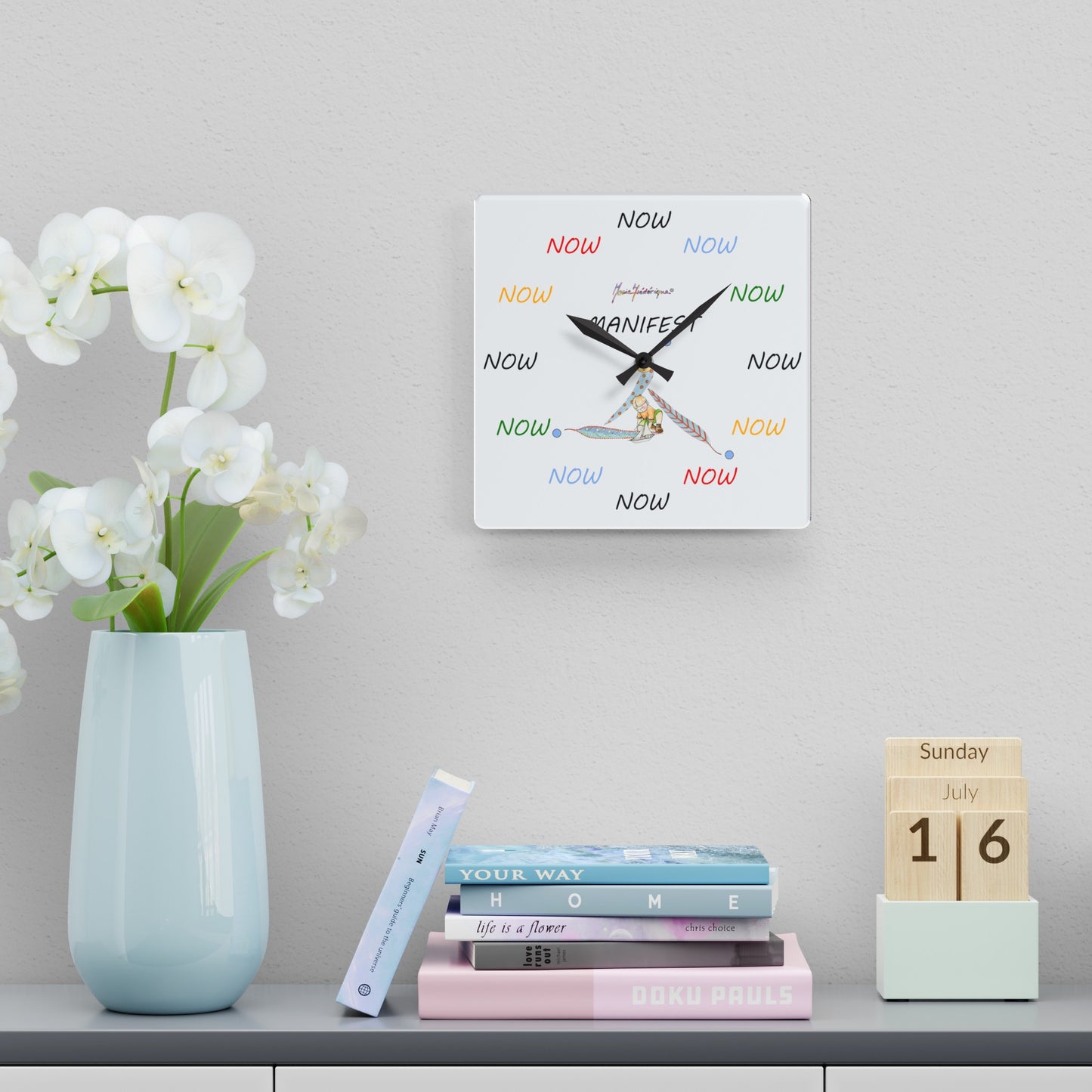 NOW - It is only ever Now! Multi Color on white Acrylic Wall Clock by Artist Marie Frederique