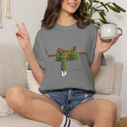 Western Saddle & Scarf Graphic T-Shirt — Rustic Western Equestrian Tee by artist Marie Frederique
