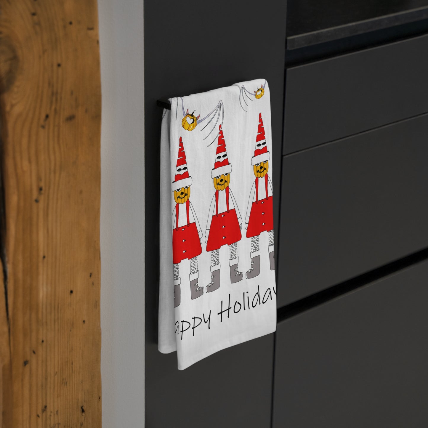 Holiday Tea Towel/Kitchen towel with Pumpkin Santas and Pumpkin Heart Bats by artist Marie Frederique