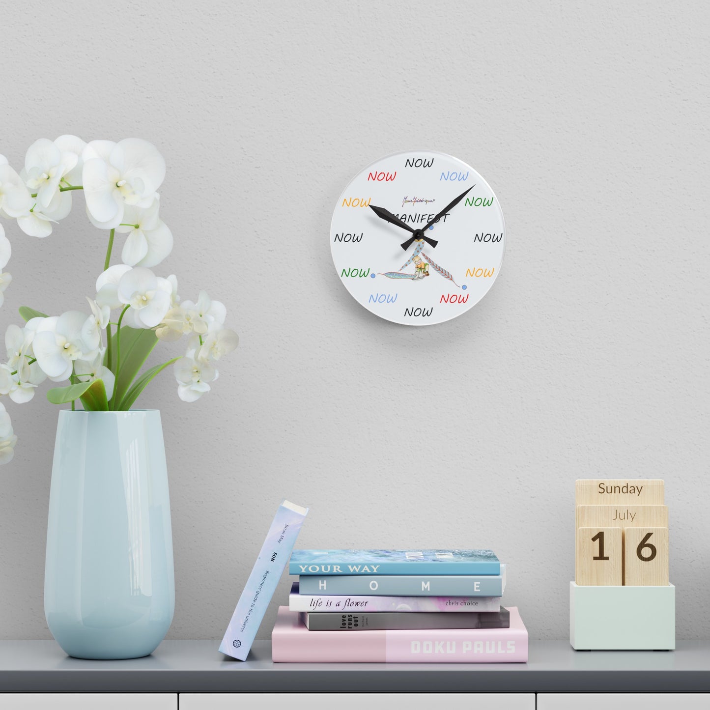 NOW - It is only ever Now! Multi Color on white Acrylic Wall Clock by Artist Marie Frederique